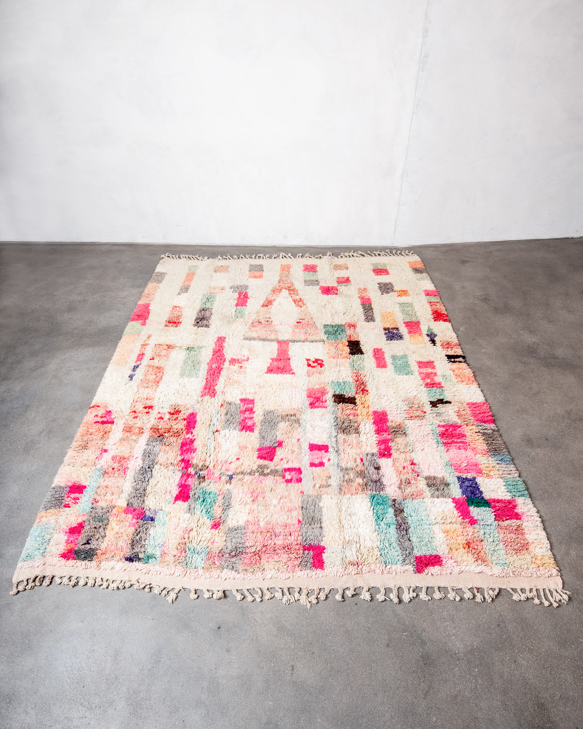 Modern, designer, handcrafted Berber rug from Morocco. Vintage carpet with beautiful colours and patterns and fluffy texture.